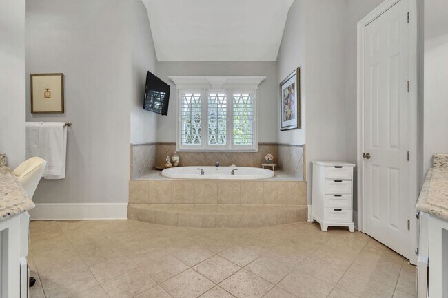 Building Photo - Fully Furnished 4 Bedroom, 3.5 Bath w/ 3 Car Garage and Unfinished Basement in Governors Club