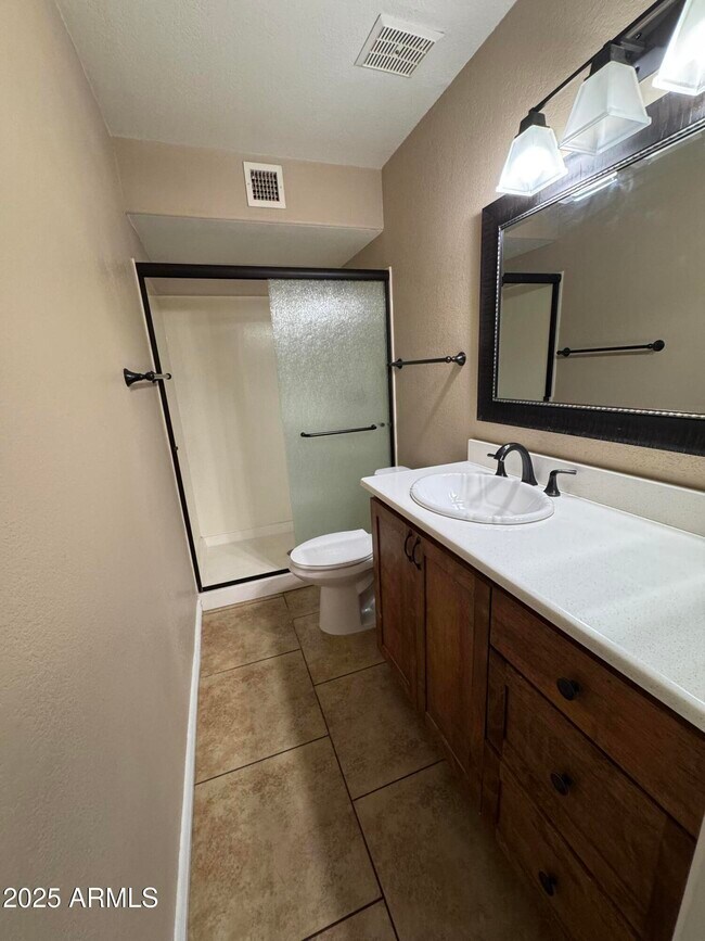 Building Photo - 3753 E Charter Oak Rd