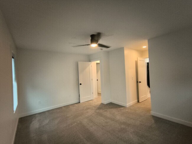 Building Photo - Modern 3-Bedroom Home Near Lake Manawa – Lake Views & Smart Home Features!