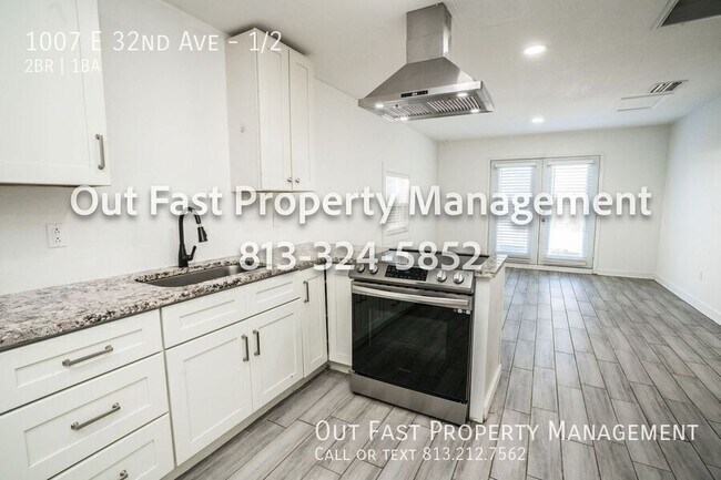 Building Photo - 1007 E 32nd Ave