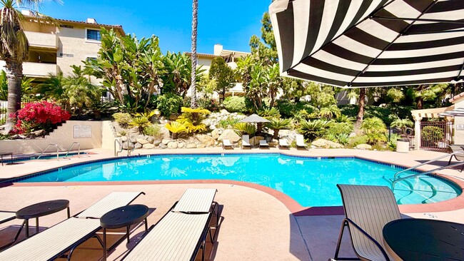 Building Photo - Beautifully Remodeled and Updated Upstairs Condo Unit in the Private & Gated Vista Way Village Co...