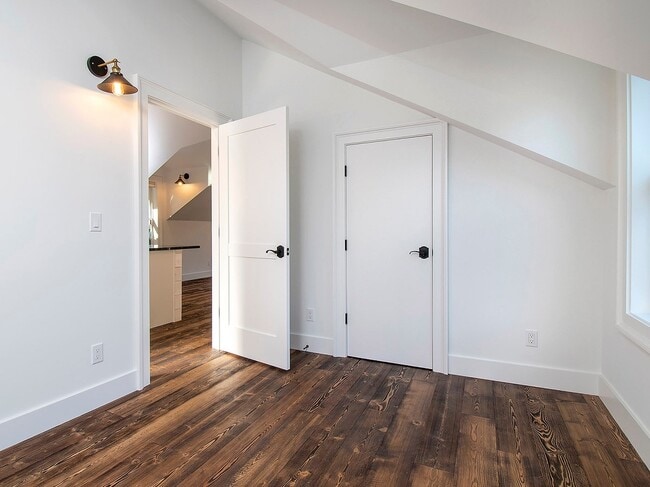 Building Photo - Expansive Loft-Style Carriage House in Private Haller Lake Estate