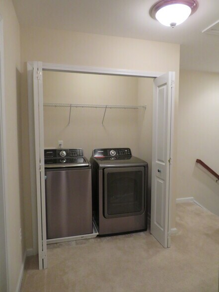 Laundry closet in loft at the top of the stairs - 2496 Stadium Dr
