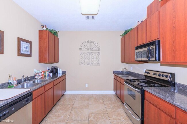 Building Photo - 1 br, 1 bath Condo - 1100 East Adoue Flat ...