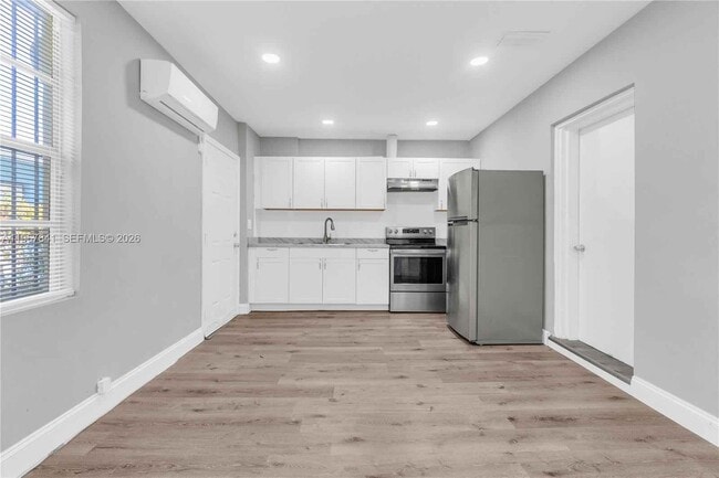 Building Photo - 6940 NW 6th Ct