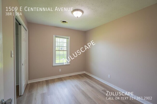 Building Photo - 1509 E Centennial Ave