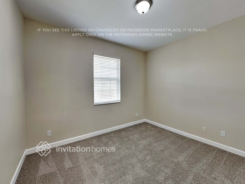 Building Photo - 9495 SW Merlin Ct