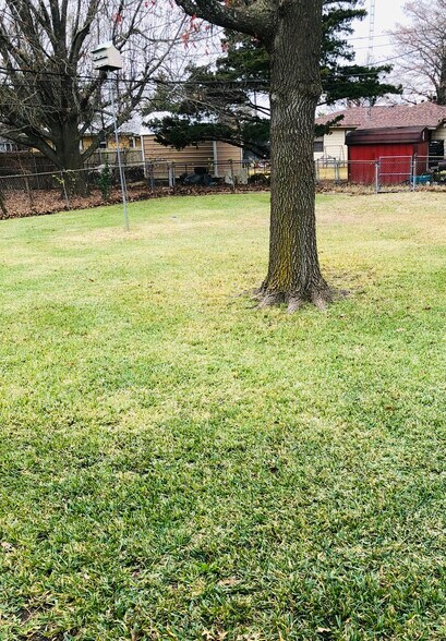 Large fence backyard. - 816 N Hughes St