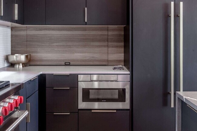 Building Photo - Modern Luxury Rental with Unobstructed Fla...