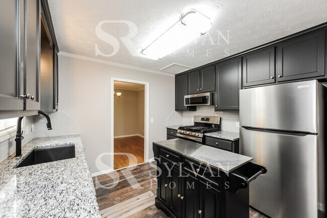 Building Photo - This lovely home is ready for your personal touch!