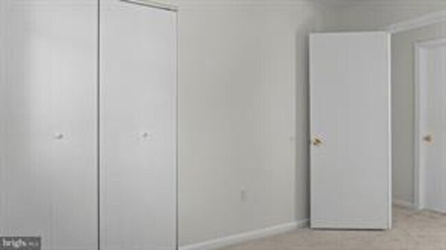Building Photo - RENOVATED TOWNHOUSE WITH 3 BEDROOMS AND 1.5 BATHS, FENCED BACKYARD