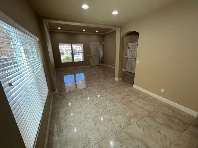 Building Photo - A Fantastic 4 Bedroom Home with the primary Downstairs, in Silverado Ranch
