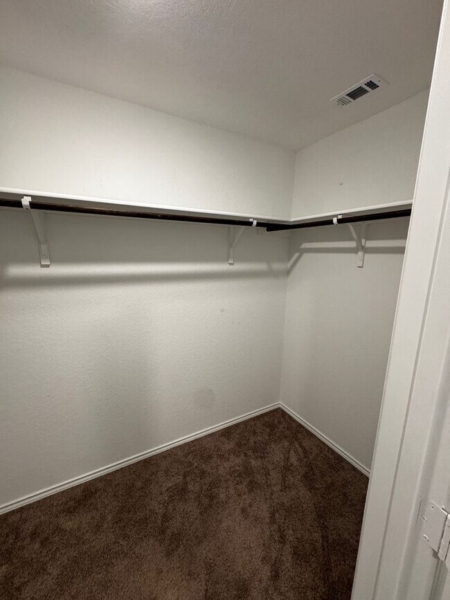 Building Photo - Modern 2024 New-Build with Open-Concept Living and Private Primary Suite in Waterwheel Subdivision