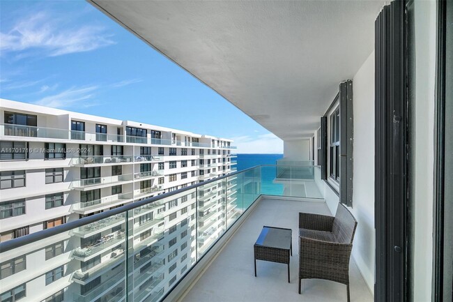 Building Photo - 9801 Collins Ave