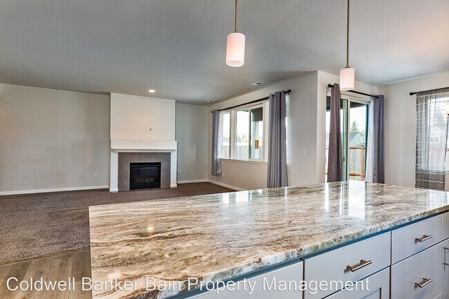 Building Photo - 4 br, 3 bath House - 14398 - 99th Way S.E.