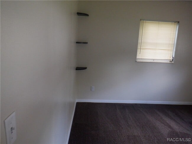 Building Photo - 9513 E Village Green Cir