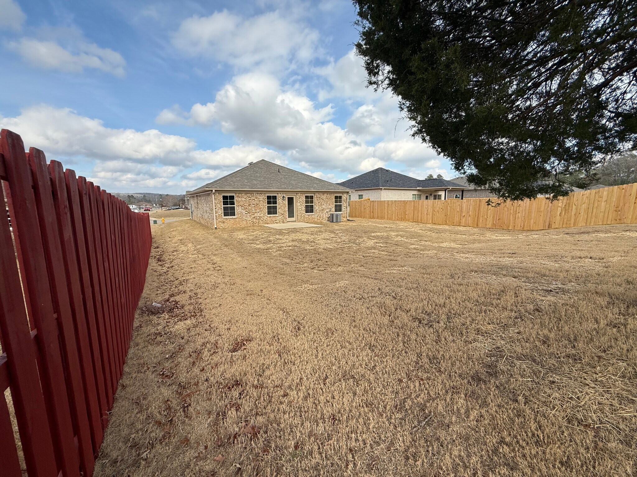 Private backyard with concrete patio - 132 Stratman Dr