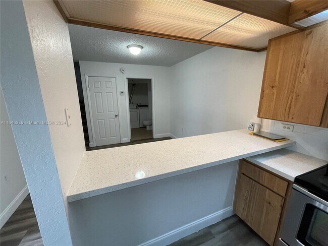 Building Photo - 1700 Embassy Dr