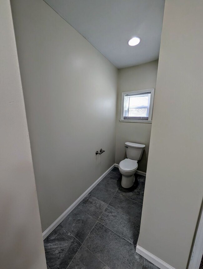 Building Photo - Large 3 Bedroom on a quiet street with Off Street Parking