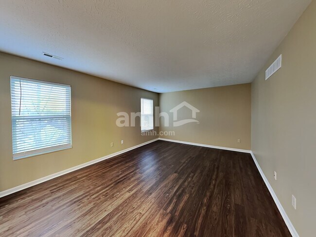 Building Photo - 6312 Satin Wood Dr