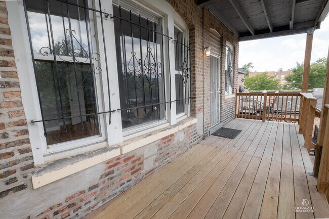 Building Photo - Modern 4BR Apartment with Hardwood Floors, Balcony & Central A/C