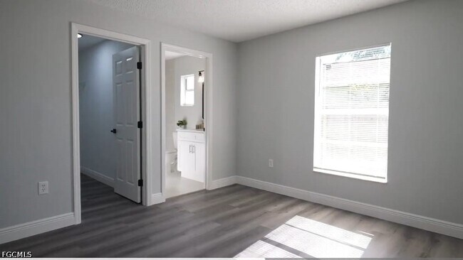 Building Photo - 8434 N River Dune St