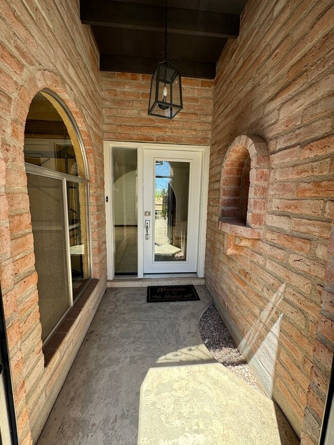 Building Photo - Sophisticated Catalina Foothills Sanctuary: Premium 3-Bedroom Townhome with 2-Car Garage
