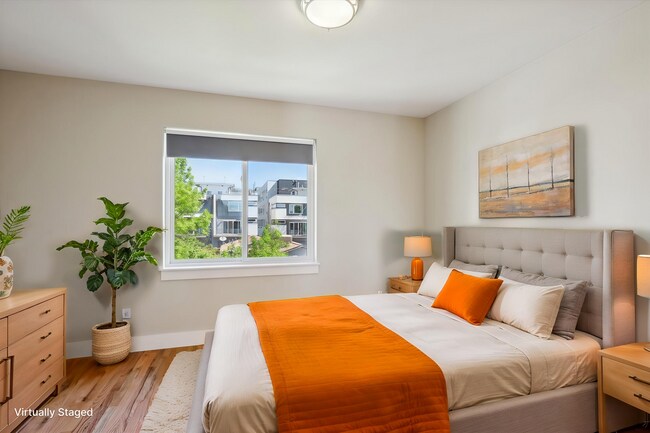 Building Photo - Modern 4-Bedroom Townhome with Rooftop Deck Near Sloan’s Lake & Light Rail