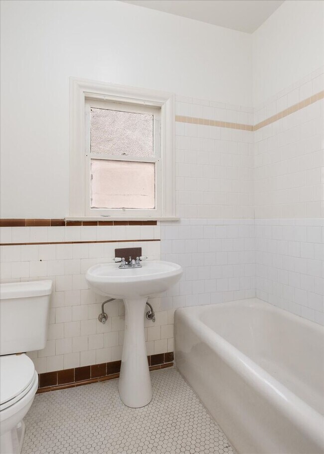 Building Photo - Emmet Terrace Triplex