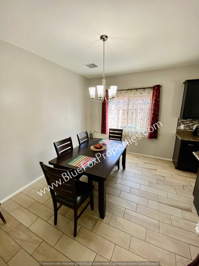 Building Photo - 9009 W Rolling Springs Dr
