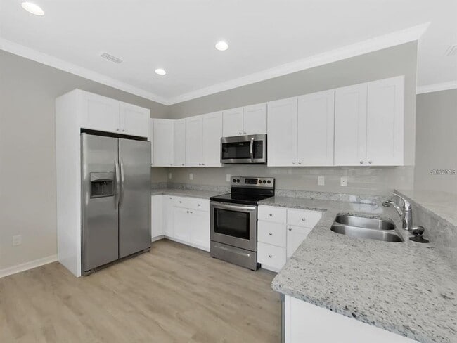 Building Photo - 8303 King Blossom Ct