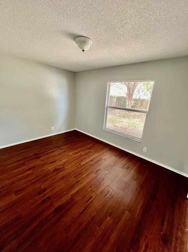 Building Photo - SPACIOUS 3BR/1.5BA w/Carport, Beautiful Wood Finish Flooring, Privacy Fenced Backyard! NO APP FEE!