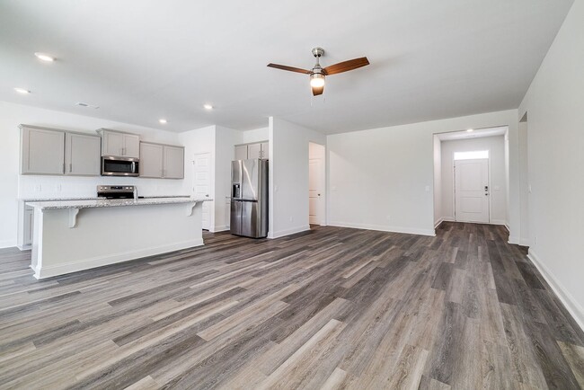 Building Photo - Beautiful 4BR Home in Woodland Trail – Top...