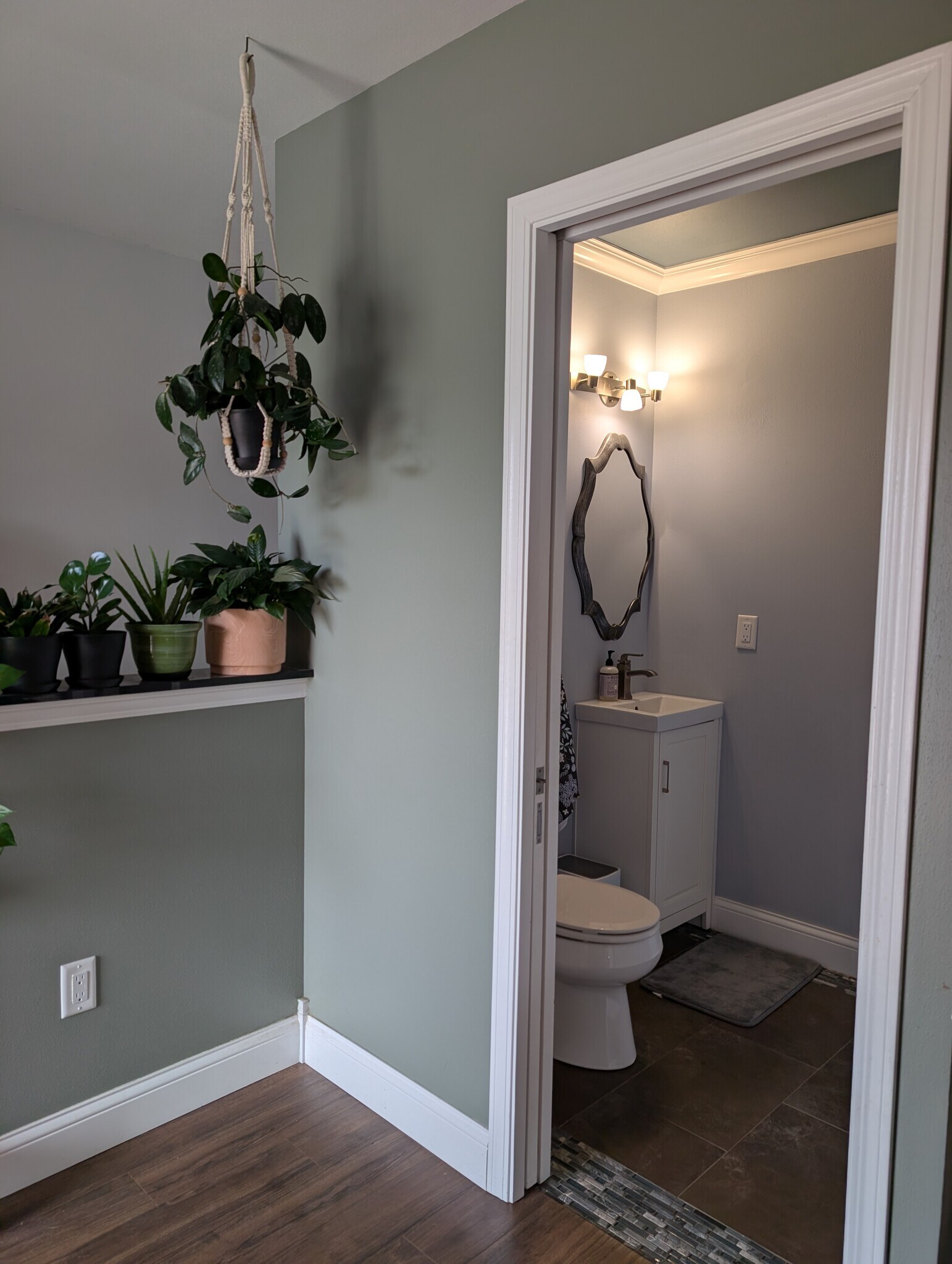 Main level powder bathroom with sliding door - 518 Lexington Dr