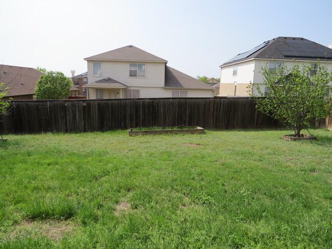 Building Photo - Expansive Living and Stylish Updates in So...