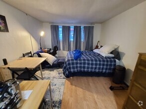 Building Photo - Cozy Studio - Off Street Parking - On Site...