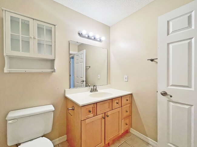 Building Photo - Beautifully Redone Modern Townhome with Large Deck, 2-Car Garage, Granite Kitchen, Vaulted Ceilin...