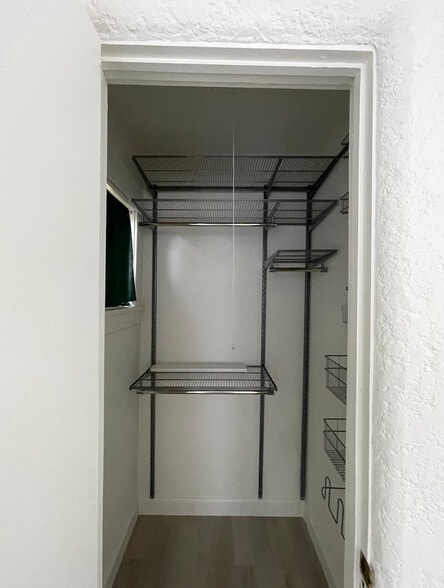 elfa system in bedroom closet - 1038 Glen Arbor Ave