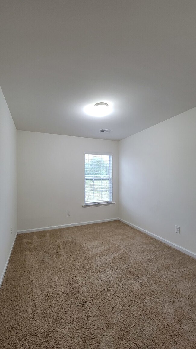 Building Photo - Modern 3-Bedroom Multiplex with 3 Full Bat...
