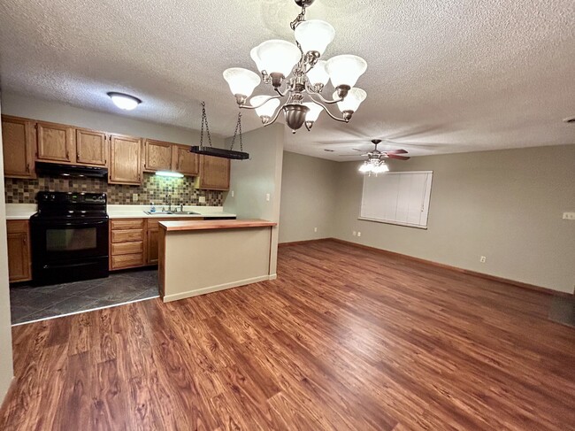 Kitchen & Living from Dining - 455 Bramblewood Ln