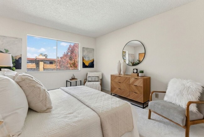 Building Photo - Modern 2-Bedroom Condo with Pool and Koi Pond Views