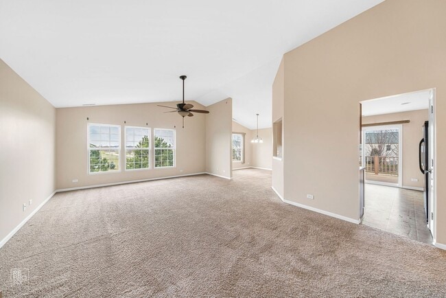 Building Photo - AUTUMN CREEK SECOND FLOOR CONDO WITH TWO CAR GARAGE