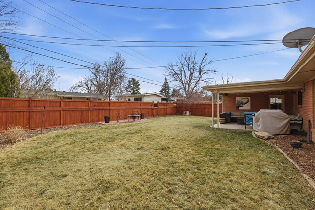 Building Photo - Beautiful 4 Bedroom/3 Bathroom Home in University Hills Area!