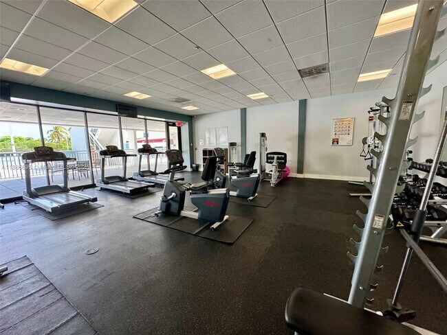 Building Photo - 3675 N Country Club Dr