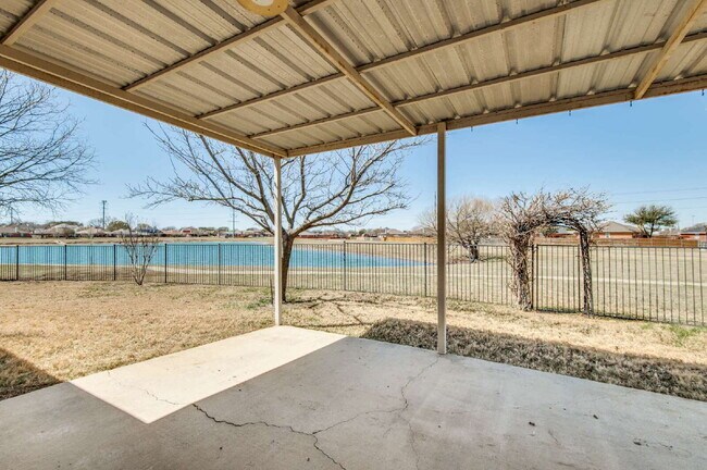 Building Photo - Beautiful 4BD Home with Pond Views & Covered Patio