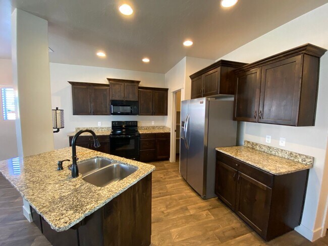 Building Photo - Gorgeous Home with HUGE backyard and play-set.