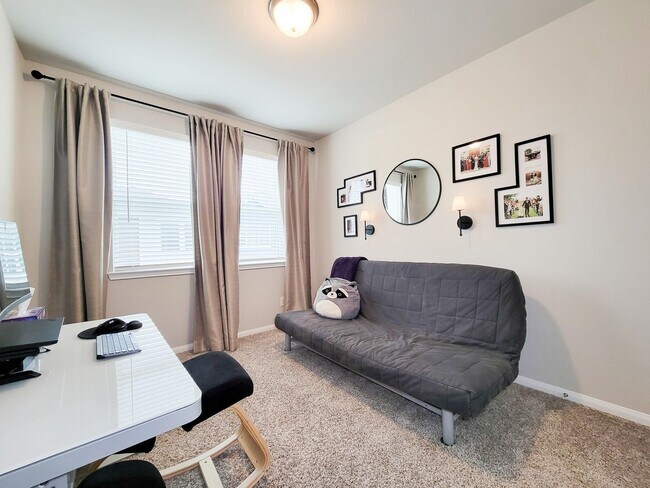 Building Photo - A true gem on a quiet corner lot, this spacious and sun-filled home is tucked away from street no...