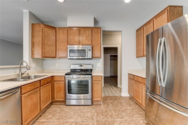 Building Photo - 9060 Candyland Ave