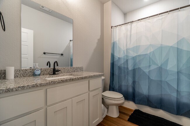 Building Photo - Nearly New Bella Vista Home Nestled in Ultimate Privacy! Furnished options available!