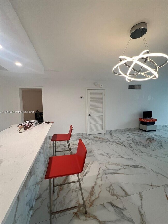 Building Photo - 10240 Collins Ave